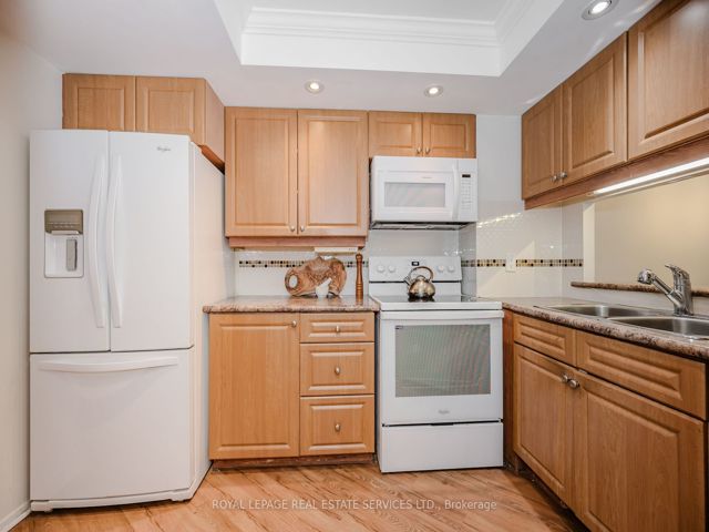 406 - 77 Maitland Pl