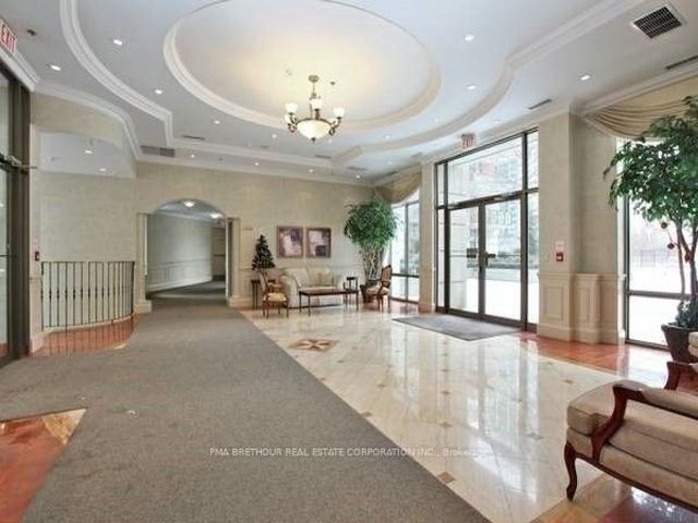 911 - 55 Harrison Garden Blvd