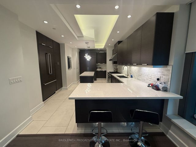 1102 - 77 Charles St W