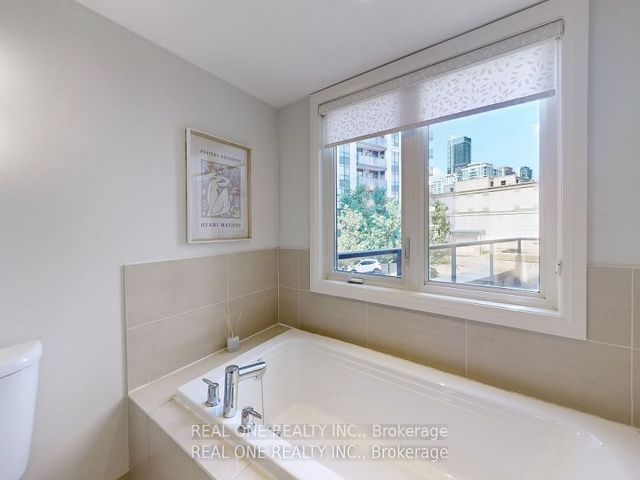 Th 49 - 115 Harrison Garden Blvd