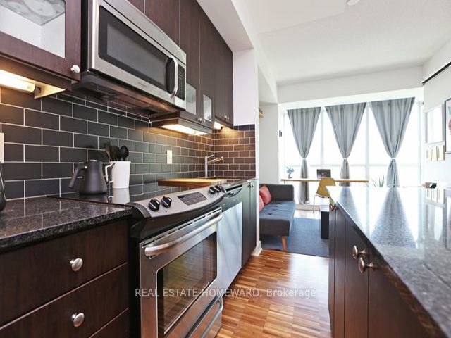 313 - 1171 Queen St W