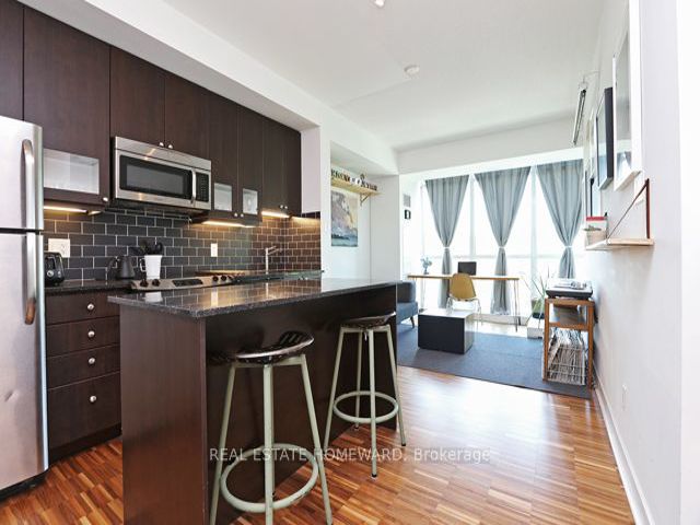 313 - 1171 Queen St W