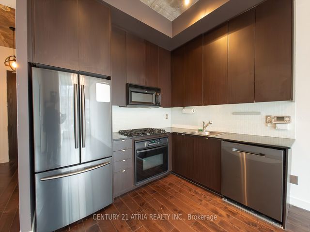 306 - 19 Brant St