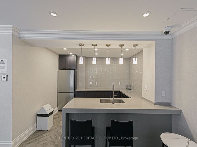 407 - 55 Harrison Garden Blvd S