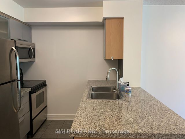202 - 18 Harrison Garden Blvd