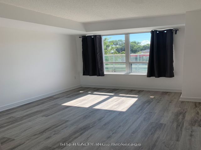 202 - 18 Harrison Garden Blvd