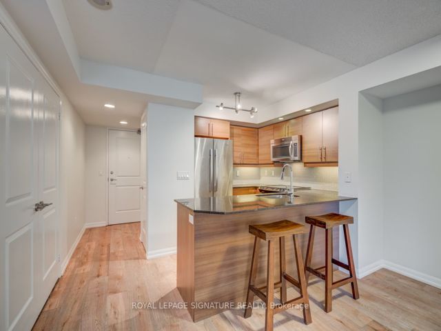 1021 - 75 East Liberty St