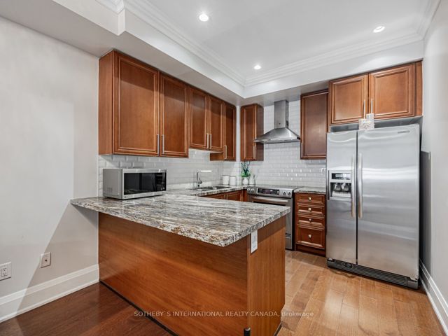 TH44 - 115 Harrison Garden Blvd