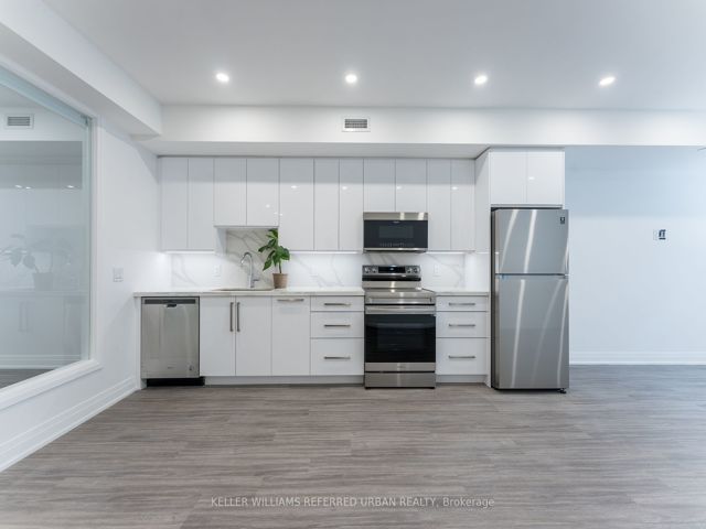 202 - 475 Queen St W