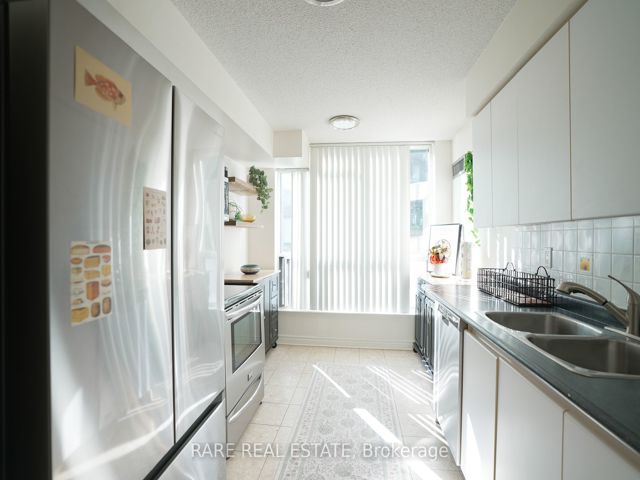 203 - 24 Wellesley St SW