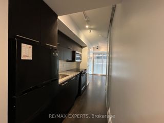 302 - 126 Simcoe St