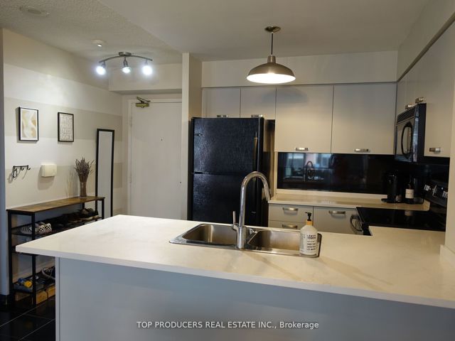 705 - 51 Harrison Garden Blvd