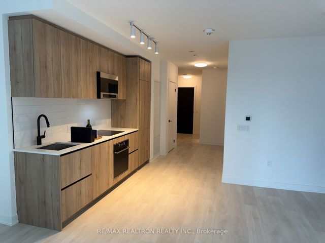 603N - 117 Broadway Ave