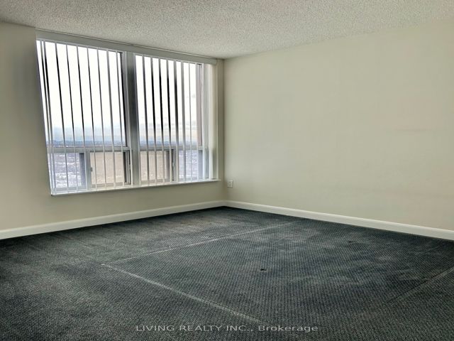 2001 - 33 Sheppard Ave E