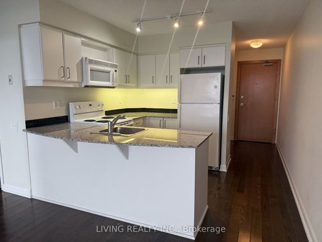 2001 - 33 Sheppard Ave E
