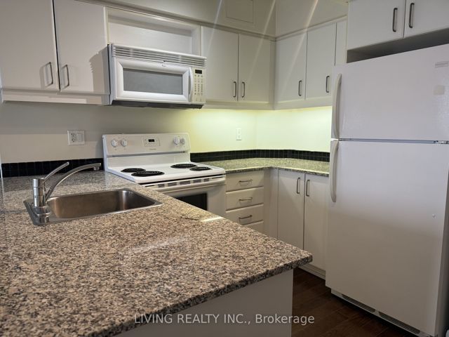 2001 - 33 Sheppard Ave E