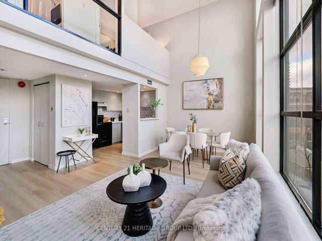 404 - 393 King St E