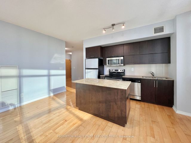 1910 - 65 Bremner Blvd