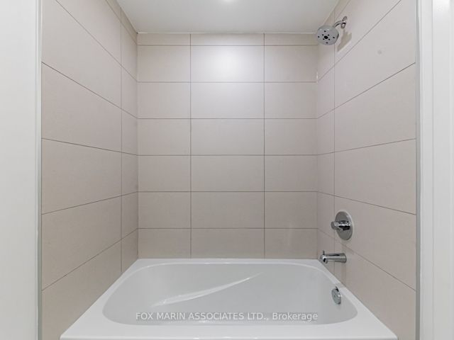 209 - 123 Portland St