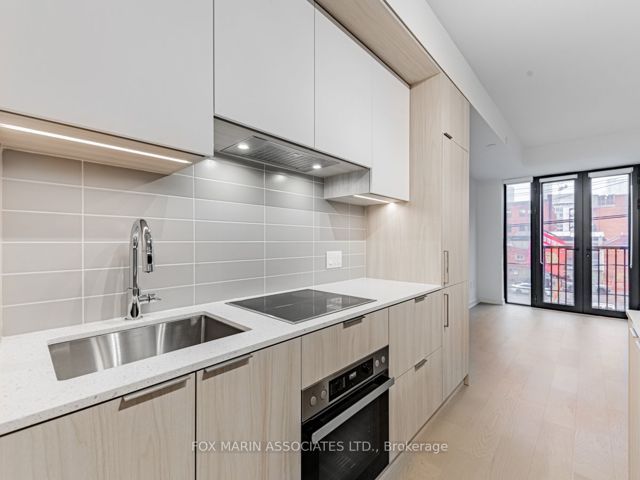 209 - 123 Portland St