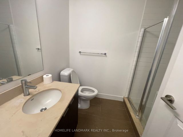2004 - 23 Sheppard Ave E