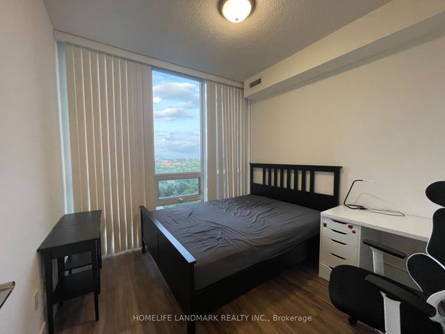 2004 - 23 Sheppard Ave E