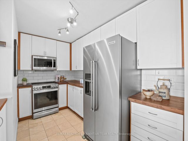 618 - 11 William Carson Cres