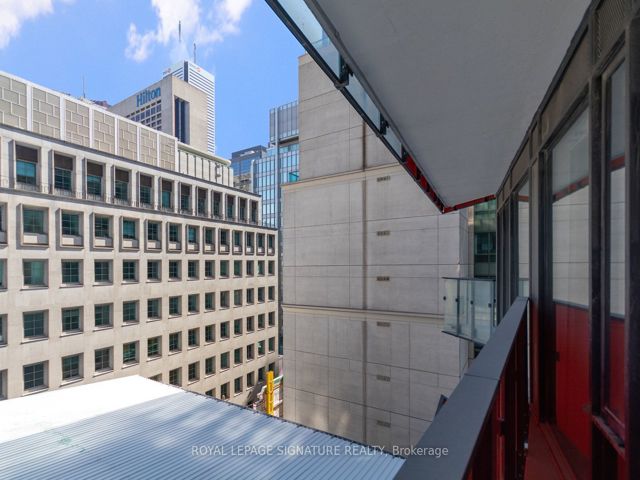 711 - 215 Queen St W