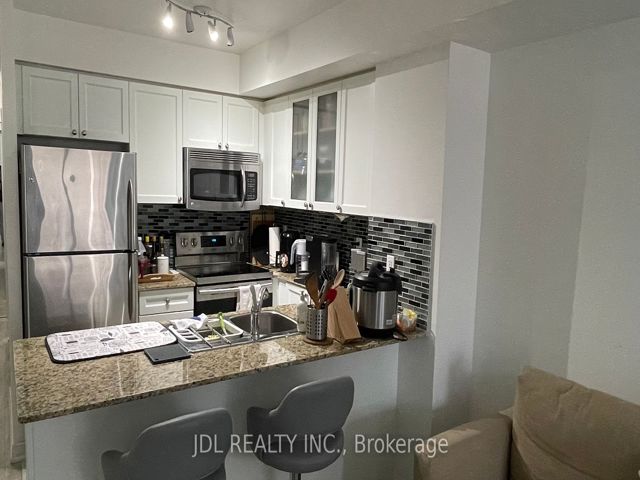 310 - 761 Bay St