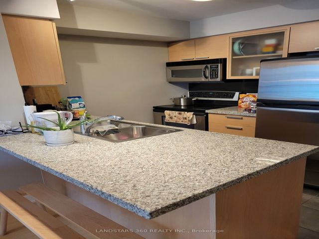 803 - 18 Harrison Garden Blvd