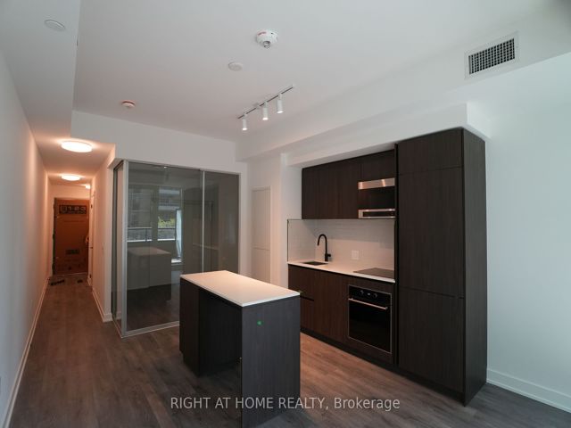 203 - 127 Broadway Ave