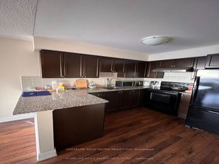 2418 - 135 Village Green Sq