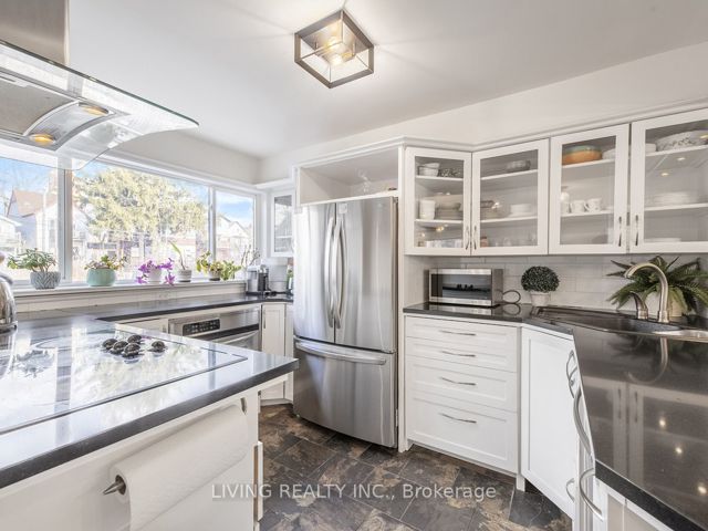 7 - 155 Woodbine Ave