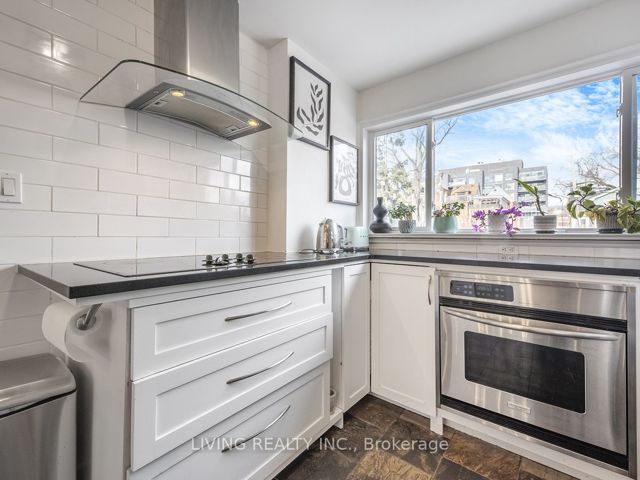 7 - 155 Woodbine Ave
