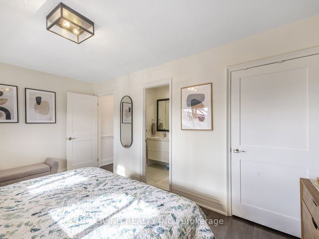 7 - 155 Woodbine Ave