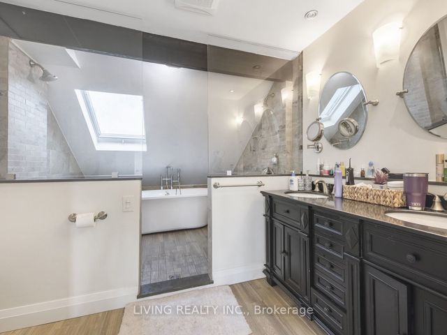7 - 155 Woodbine Ave