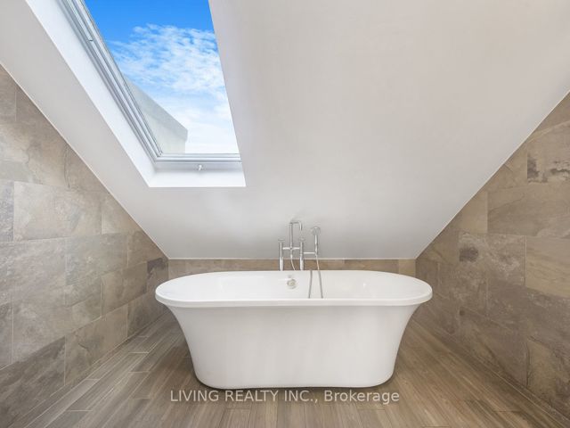 7 - 155 Woodbine Ave