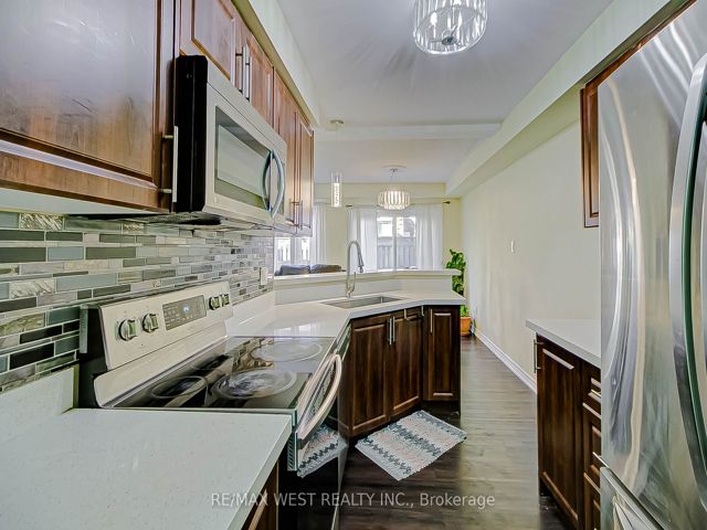 12 - 6400 Lawrence Ave E