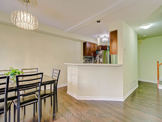 12 - 6400 Lawrence Ave E