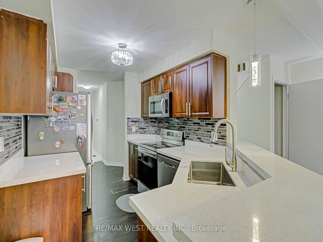 12 - 6400 Lawrence Ave E
