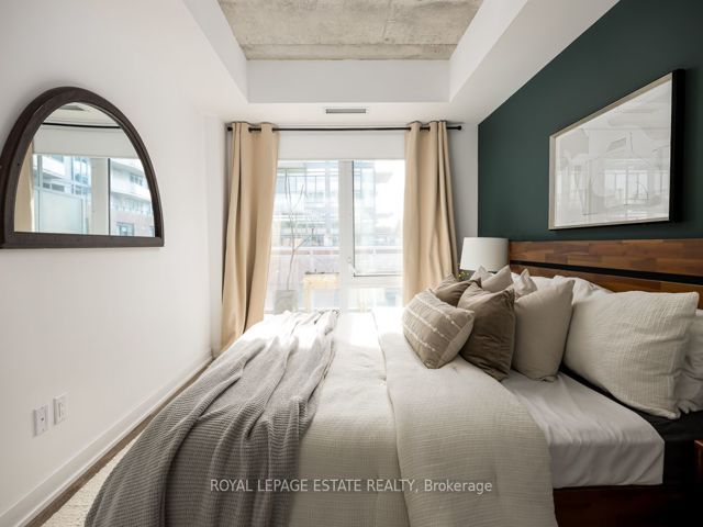 408 - 665 Queen St E