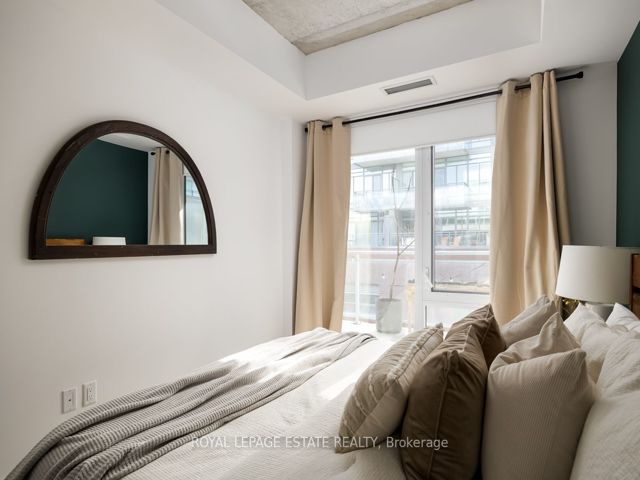 408 - 665 Queen St E