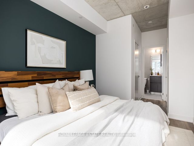 408 - 665 Queen St E
