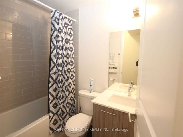 303 - 1630 Queen St E
