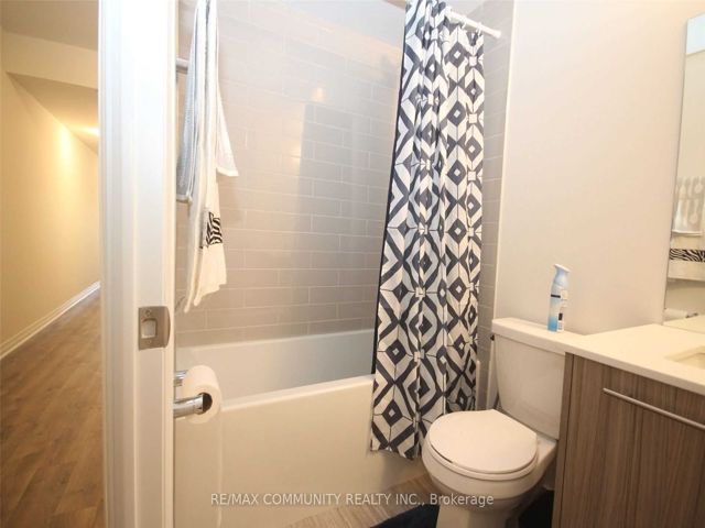 303 - 1630 Queen St E