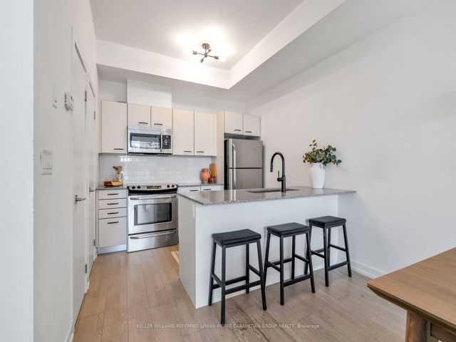 3 - 1331 Gerrard Ave E