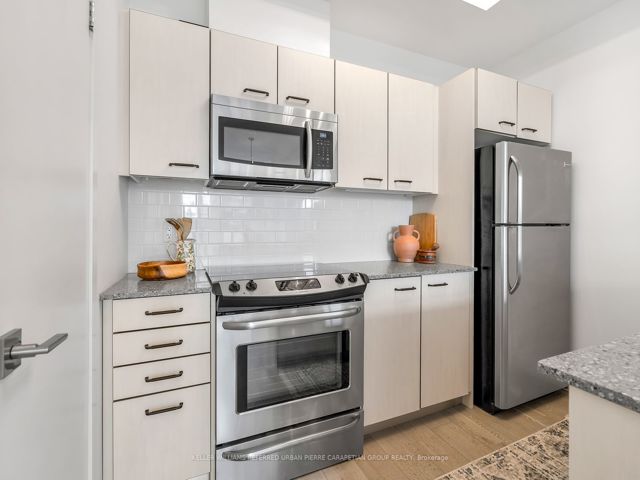 3 - 1331 Gerrard Ave E