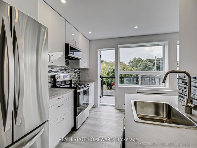 7 - 419 Woodbine Ave