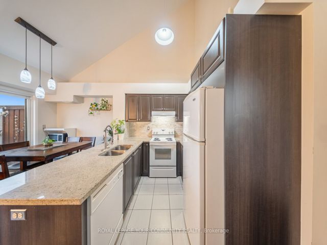 48 - 651F Warden Ave