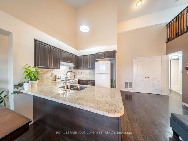 48 - 651F Warden Ave